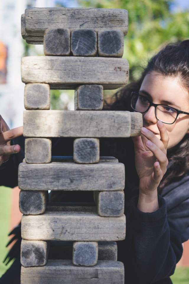 large garden jenga being played