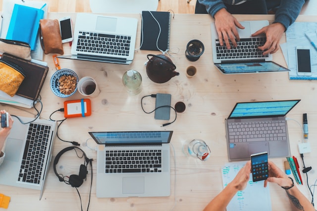 desk of a team collaborating