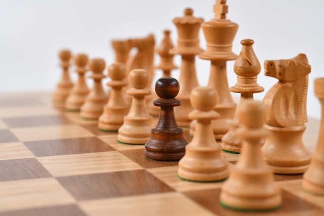 wrong color chess pawn in a starting chess lineup